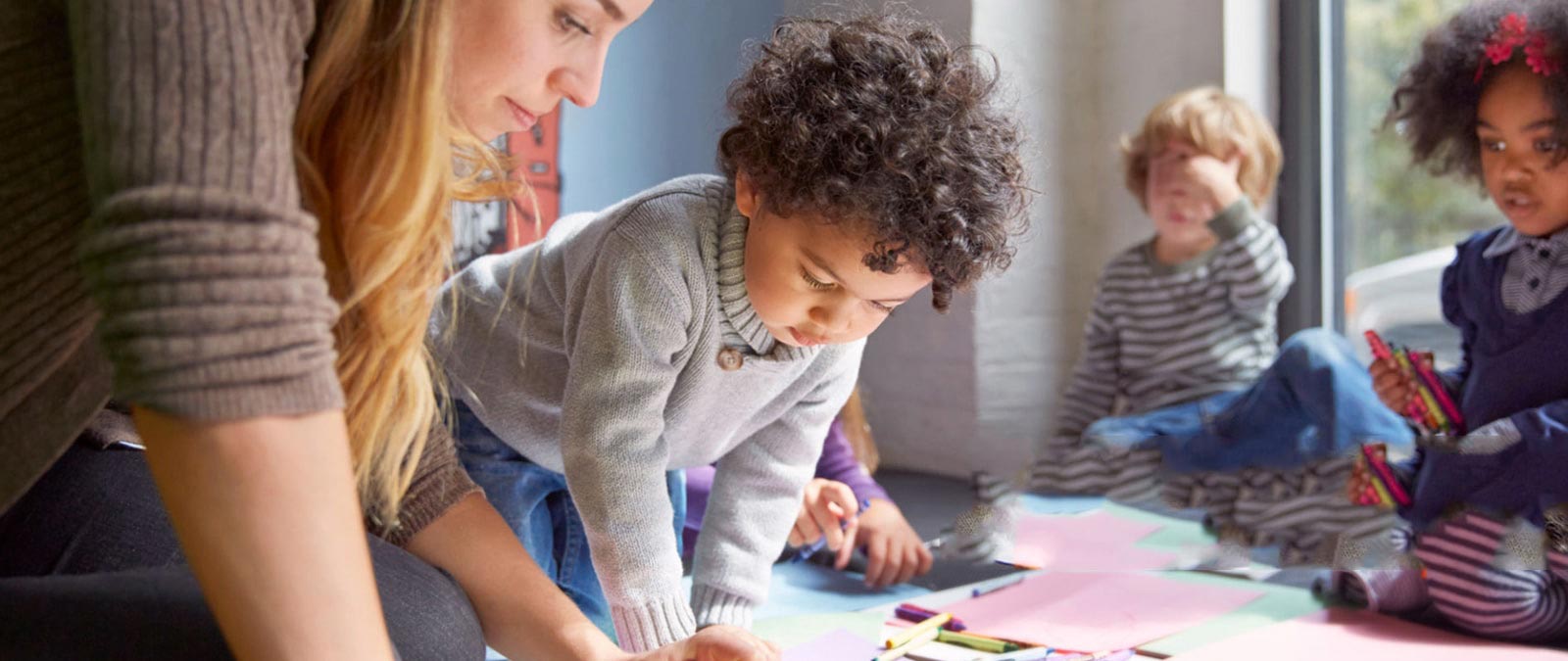 Students coloring on paper