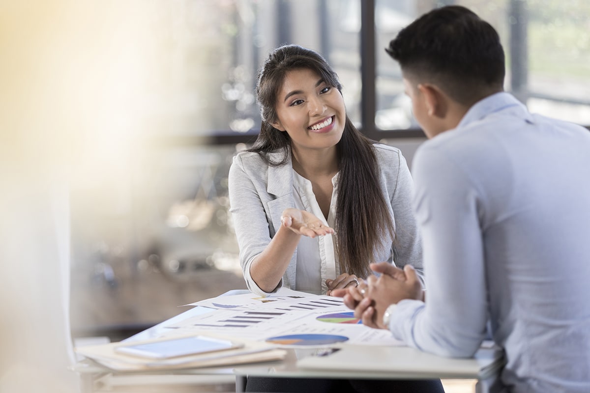 Two people meeting in office