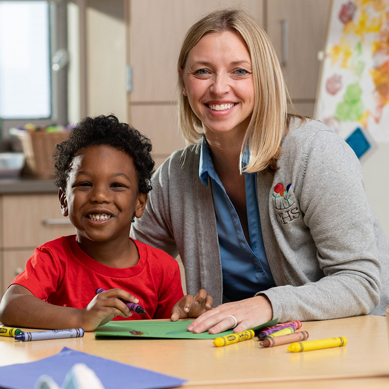 Teacher working with a student