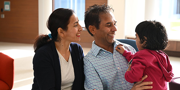 Family Playing with Child