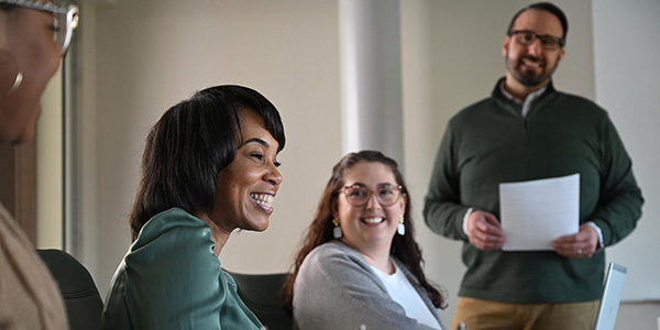 A group of people meeting in an office