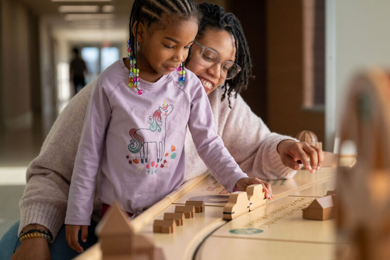 Mother and Daughter talking at school