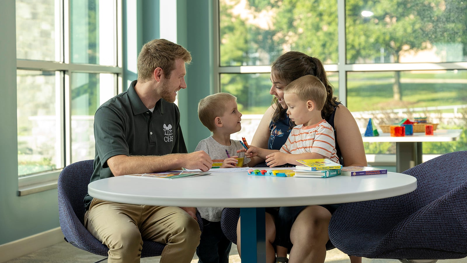 CHS team member working with a family